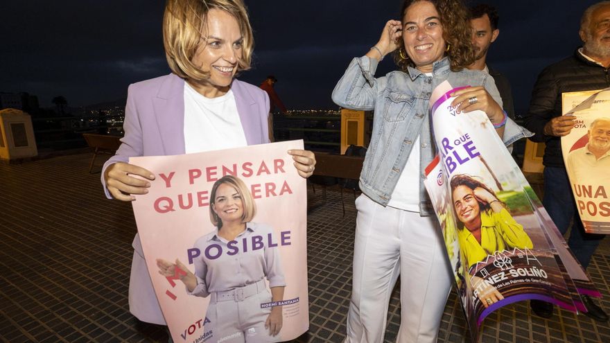 La candidata de Unidas Sí Podemos a presidenta de Canarias, Noemí Santana, participa en una pegada simbólica de carteles con motivo del inicio de la campaña electoral. EFE/ Quique Curbelo