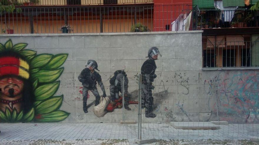 El graffiti de los antidisturbios que no gusta al concejal del PP de Lavapiés