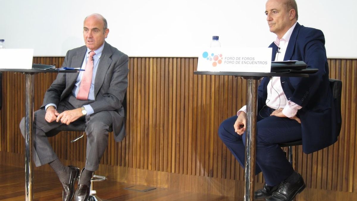 Luis de Guindos junto a Miguel Sebastián
