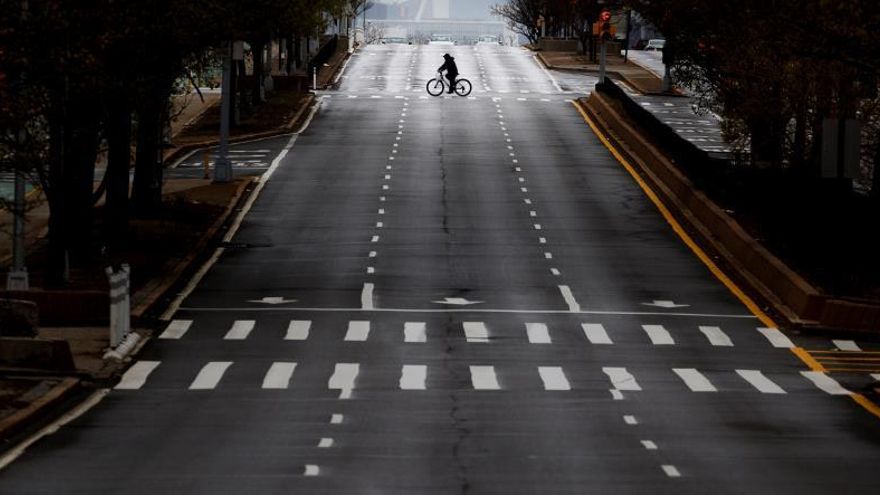 A bicyclist with a street to themselves in New York, New York, USA, on 26 April 2020.