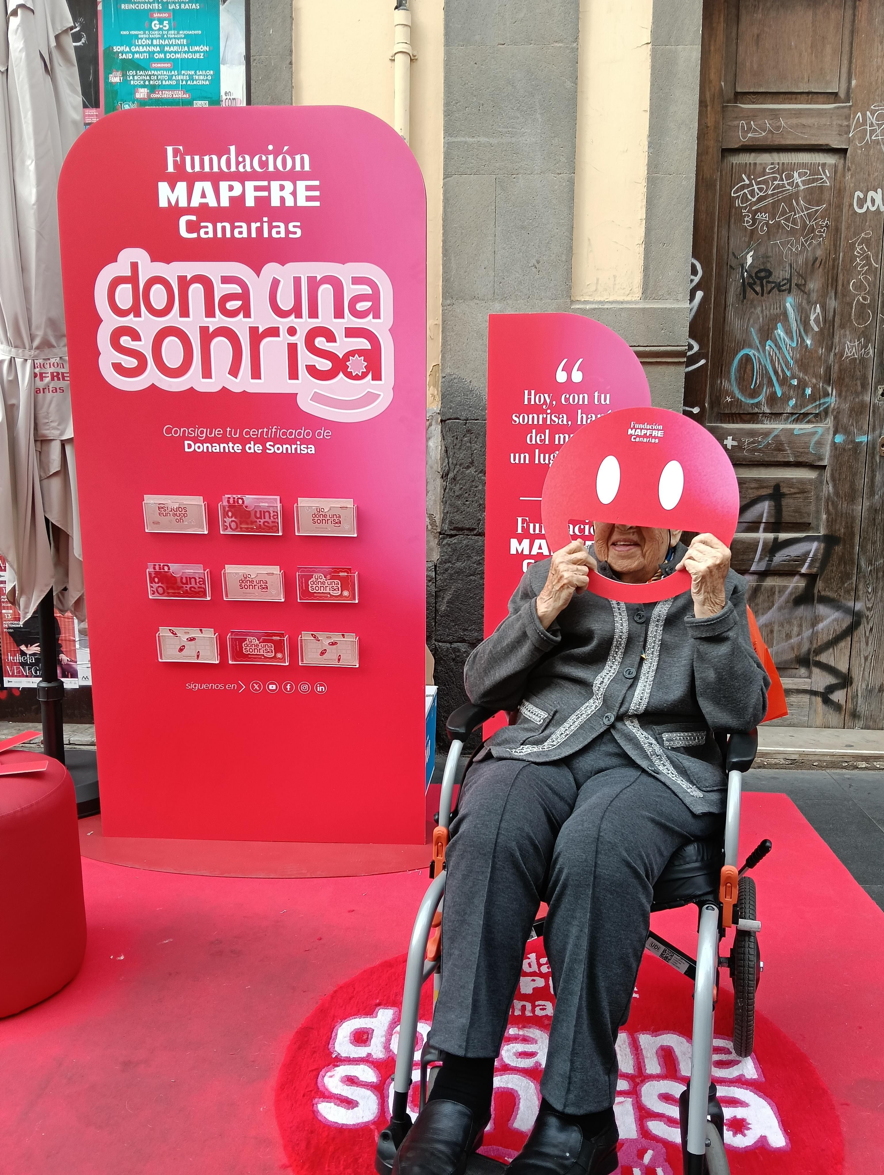 Donante de sonrisa en la calle Triana.