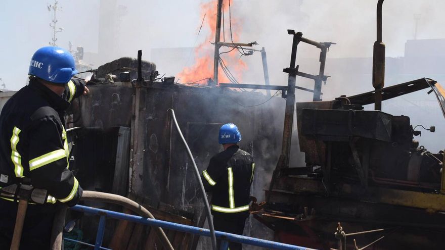 A handout photo released by the Odesa City Hall Press Office on 23 July 2022 shows firefighters working to put out a fire in a sea port of Odesa, southern Ukraine. EFE/EPA/ODESA CITY HALL PRESS OFFICE