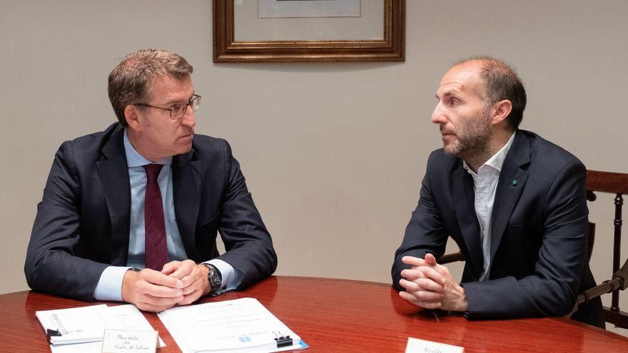 El presidente de la Xunta, Alberto Núñez Feijóo (izquierda) y el alcalde de Ourense, Gonzalo Pérez Jácome