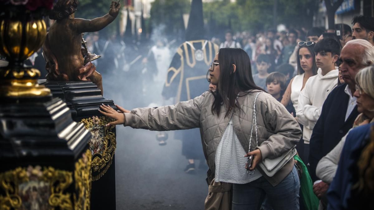 La salida procesional de la hermandad de Ánimas, en imágenes