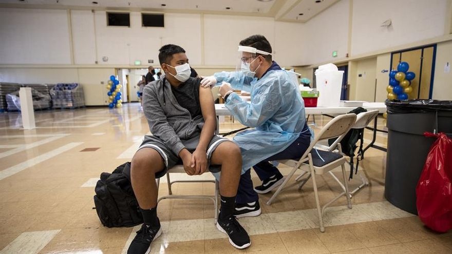 Andres, 14 years-old, gets vaccinated against Covid-19 during a coronavirus vaccination campaign at the Woodrow Wilson Senior High School in El Sereno, East of Los Angeles, California, USA, 30 August 2021. Starting 30 August, mobile vaccination teams will visit every LAUSD middle and high school campus to inoculate LAUSD (Los Angeles Unified School District) employees and students age 12 and older.