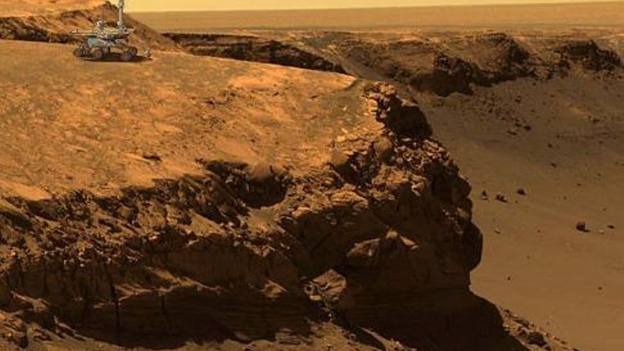 Ilustración de Opportunity superpuesta en el borde del cráter Victoria para ver su proporción. La imagen la tomó el propio rover. NASA/JPL/Cornell