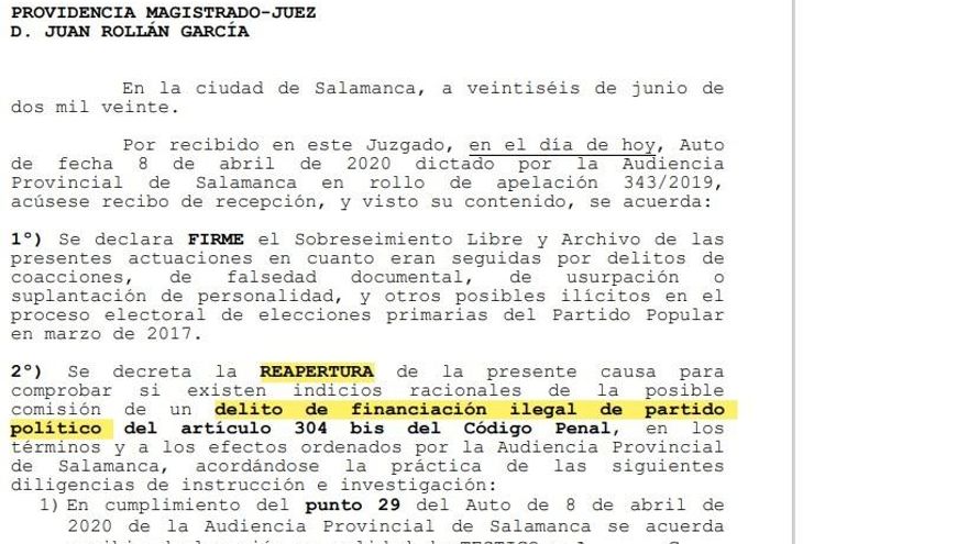 Auto del juzgado que decreta la reapertura de la causa por presunta financiación ilegal del PP de Salamanca.