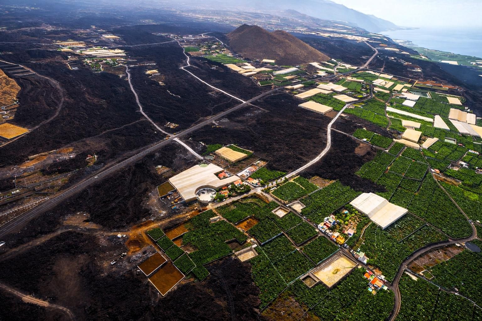 Vista aérea de la zona de plataneras afectada por la erupción del  volcán Tajogaite.