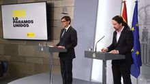 Pablo Iglesias y Salvador Illa, en una rueda de prensa.