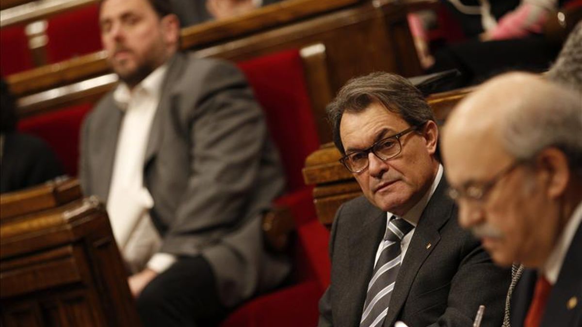Junqueras, Mas y Mas-Colell, en el Parlament.