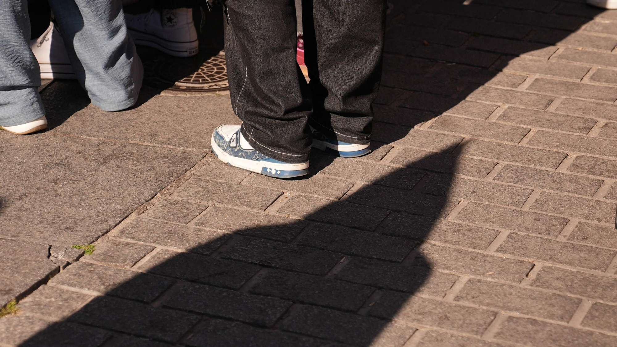 La estación de penitencia de la Hermandad Universitaria, en imágenes