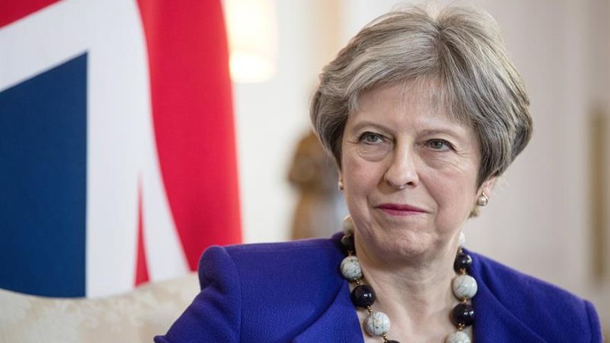 May asegura que los inmigrantes "tratados injustamente" serán "compensados"