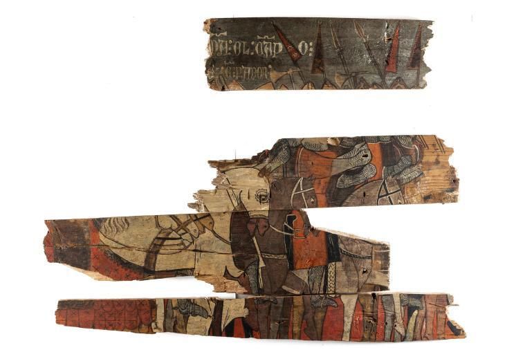 Extracto de una escena de batalla en tablas policromadas de madera medievales