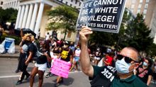 People demonstrate during a Black Lives Matter protest near the White House in Washington, DC, USA, 06 June 2020.