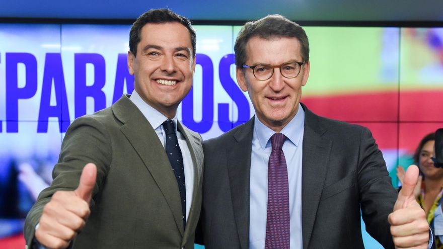 El presidente del PP andaluz y presidente electo de la Junta de Andalucía, Juanma Moreno (i) y el presidente del Partido Popular, Alberto Núñez Feijóo (d).