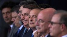 El presidente de Brasil, Jair Bolsonaro, asiste hoy martes a una ceremonia gubernamental de 300 días en el Palacio do Planalto en la ciudad de Brasilia (Brasil).