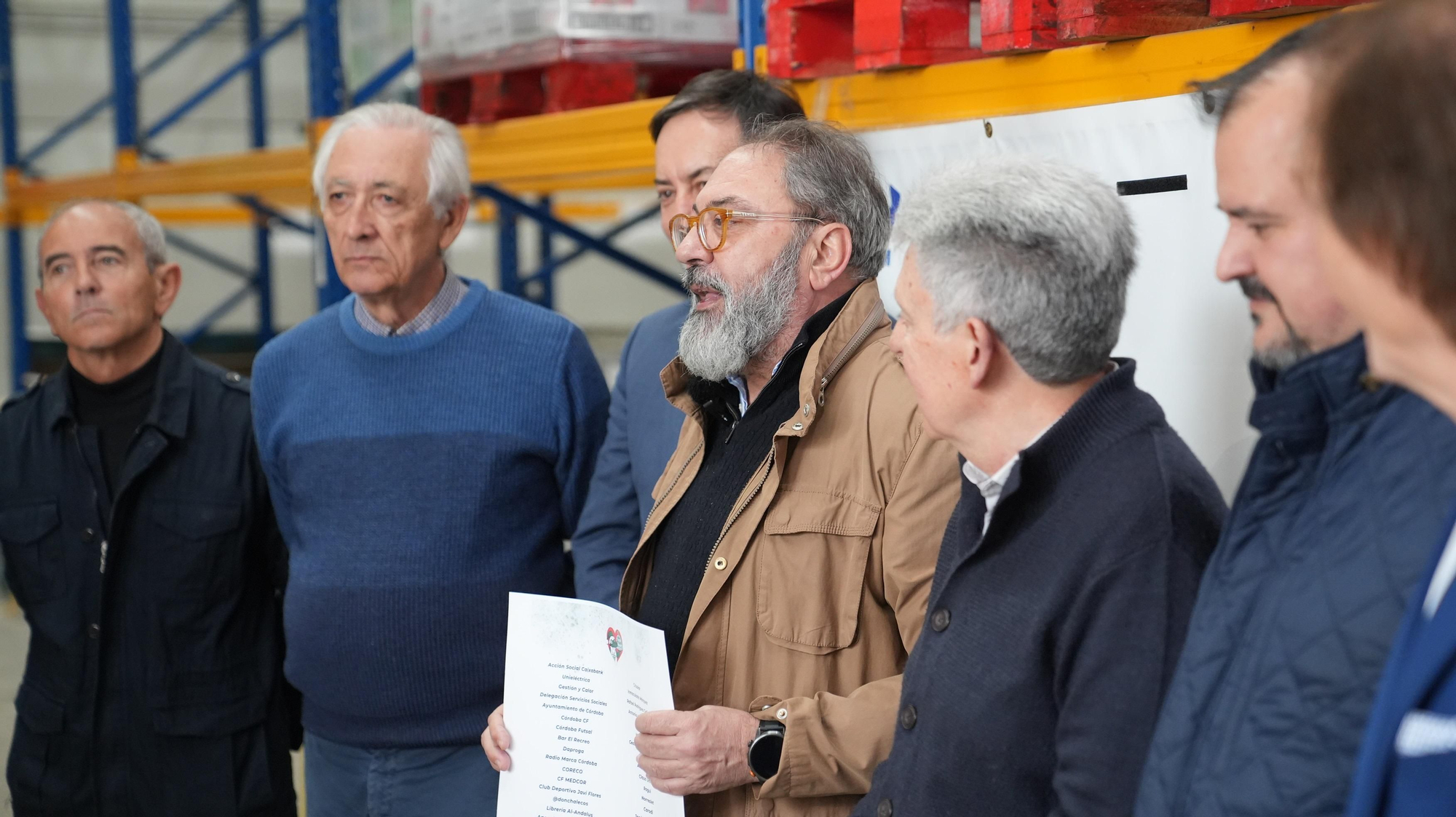 Entrega del cheque simbólico al Banco de Alimentos por el Calendario Solidario y del Menú de Nochebuena Cocinillas CCF