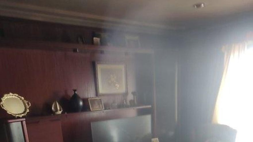 Un incendio en una vivienda de Reinosa obliga a evacuar a un vecino