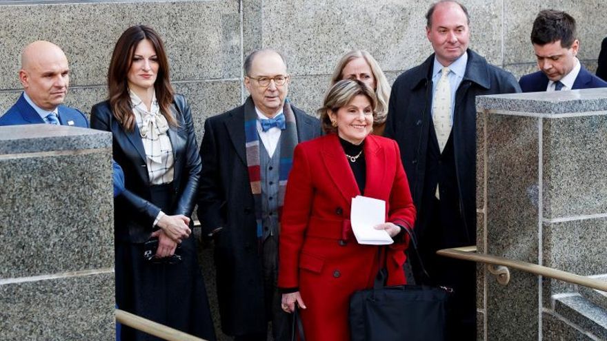 Attorney Gloria Allred (3-R), who represented three of the six women who testified in Harvey Weinstein's criminal trial, smiles while standing in front of members of Weinstein'Äôs legal team, including Arthur Aidala (L) and Donna Rotunno (2-L), after Weinstein was convicted of sexual assault and rape in New York State Supreme Court in New York, New York, USA, 24 February 2020.