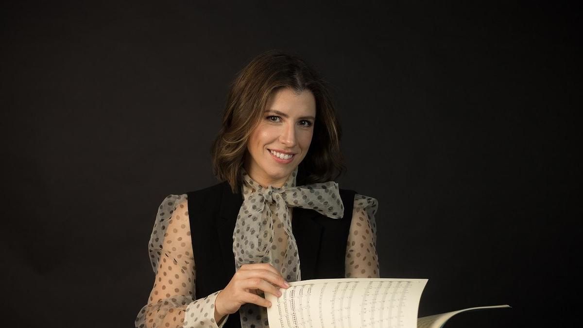 Desde que Irene Gómez asumió la dirección de la Oliva de Salteras, la banda se parece a "una orquesta sinfónica"
