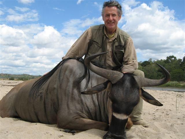 Miguel Blesa, tras cazar un ñú, en Namibia, en 2007.