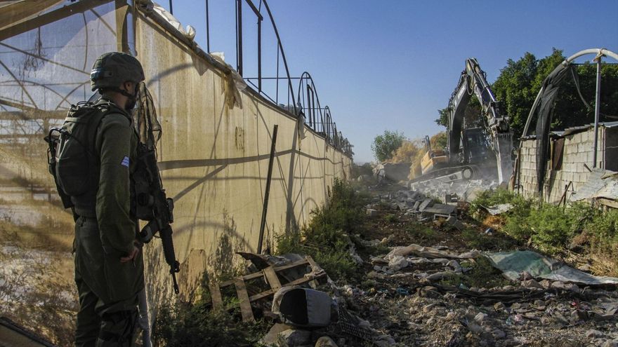Jordan Valley, West Bank, Palestine: Israeli army bulldozer on duty during the demolition of Palestinian homes in the northern Jordan Valley