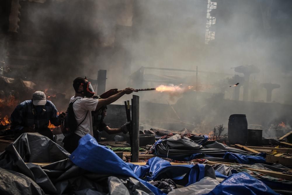 Enfrentamientos entre la policía y los partidarios de Mosri en El Cairo. / Mosa'ab Elshamy