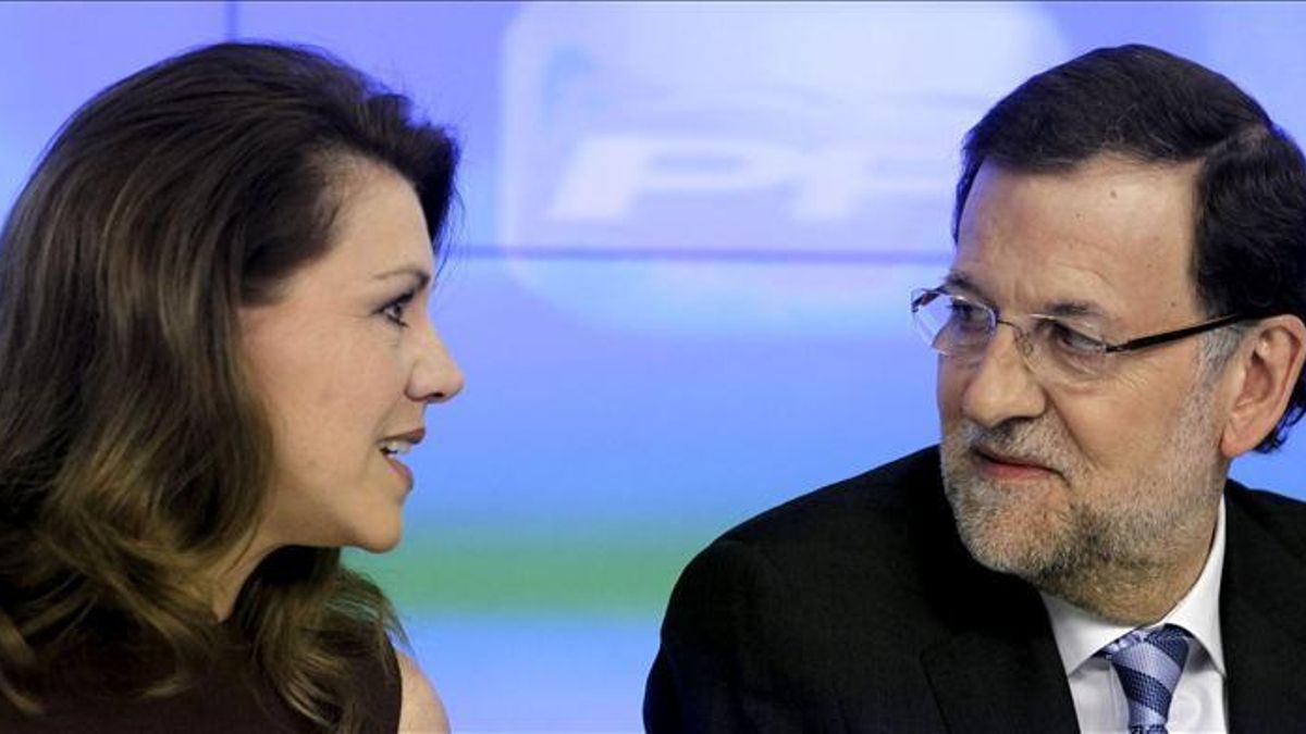 Mariano Rajoy junto a la secretaria general del PP